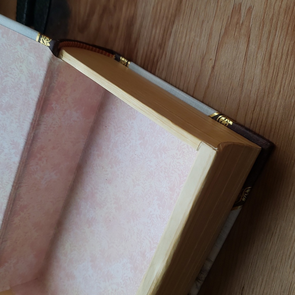 Elegant Gold and Cream Coffee Table Book with Hidden Compartment - Picture 10 of 13